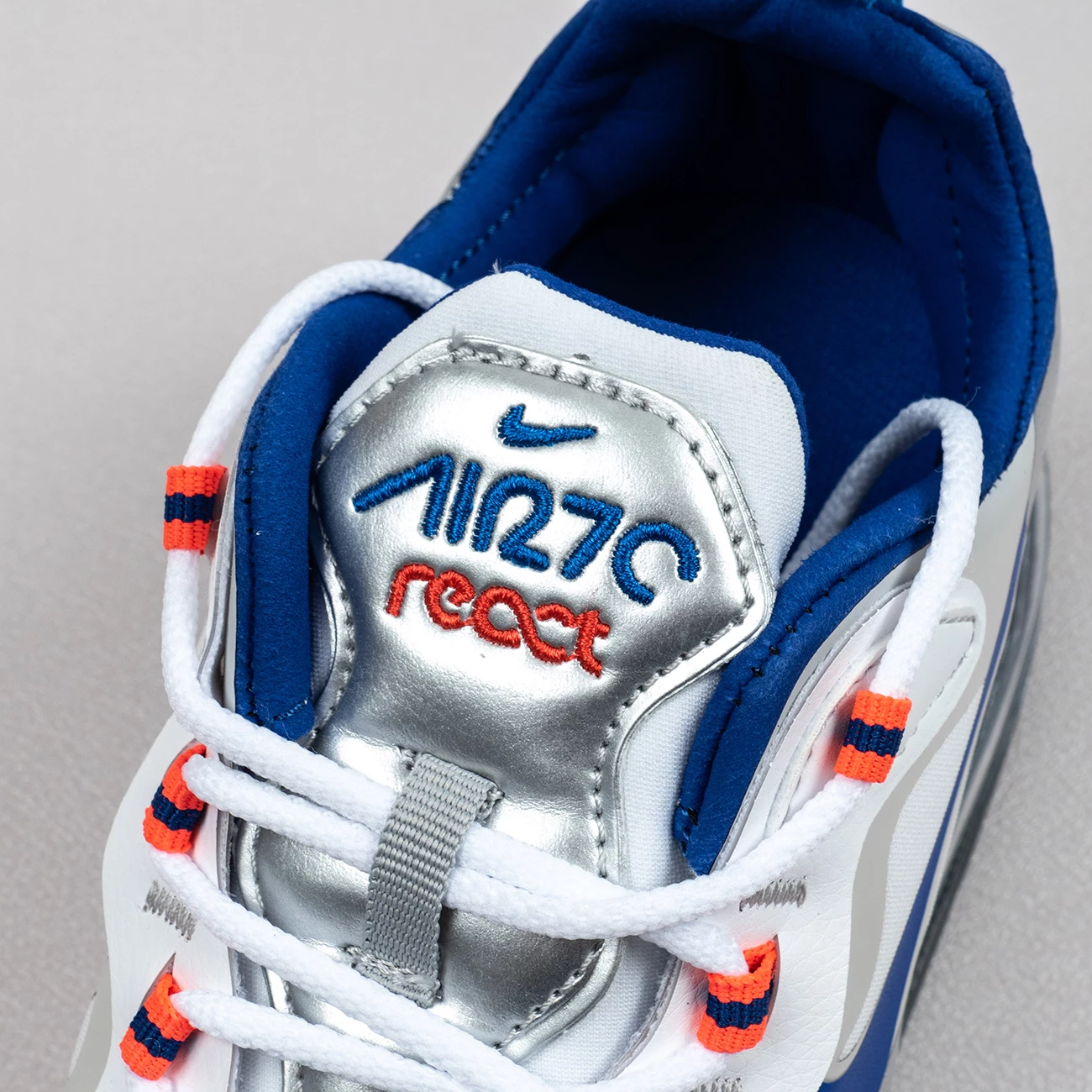 Fit Sporting Goods Nike Air Max 270 React ‘Knicks’ White Silver Orange Blue CW3094-100 6 Fit Sporting Goods Nike Air Max 270 React ‘Knicks’ White Silver Orange Blue CW3094-100 - Image 4